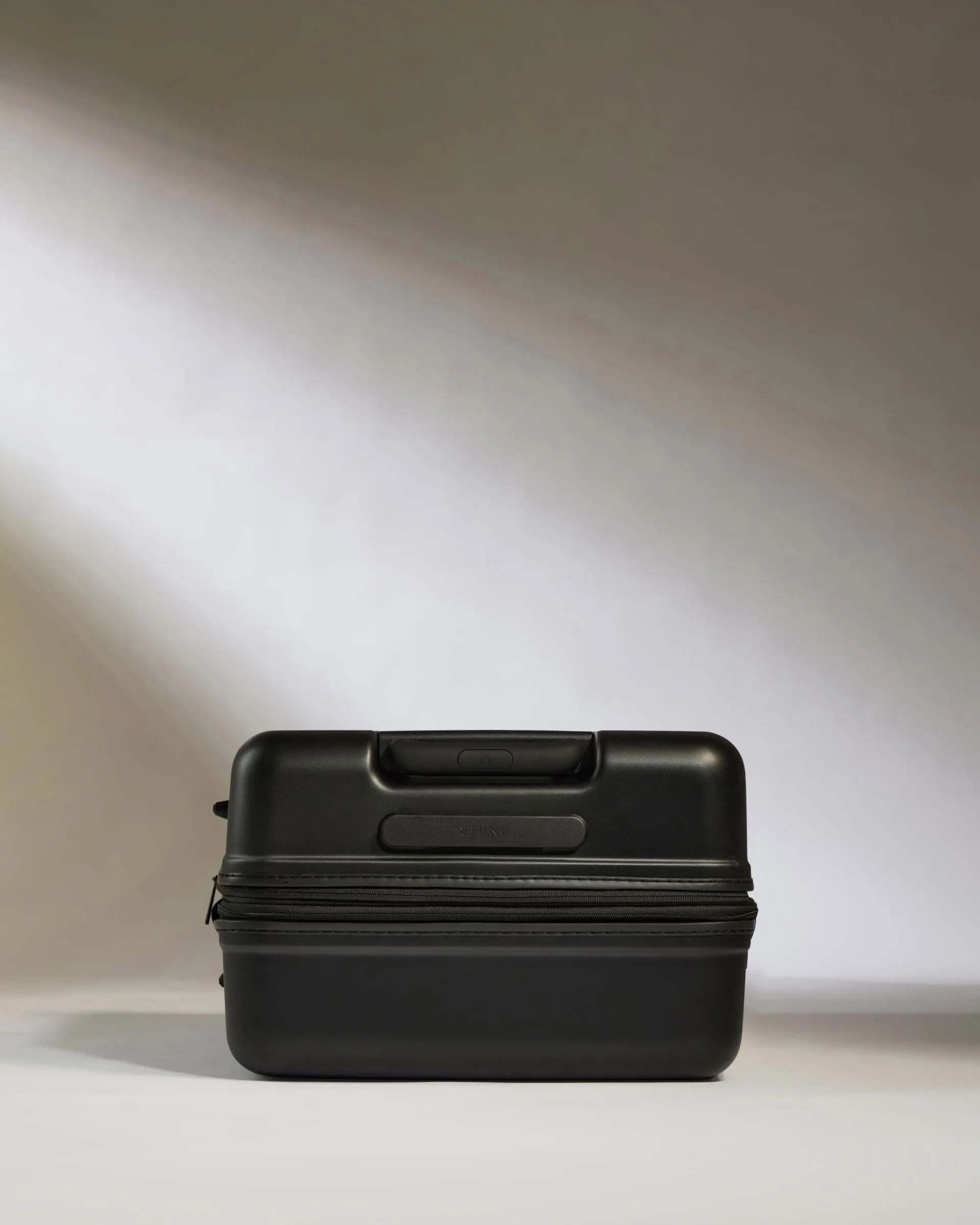 Medium Luggage in Black - Icon Stripe