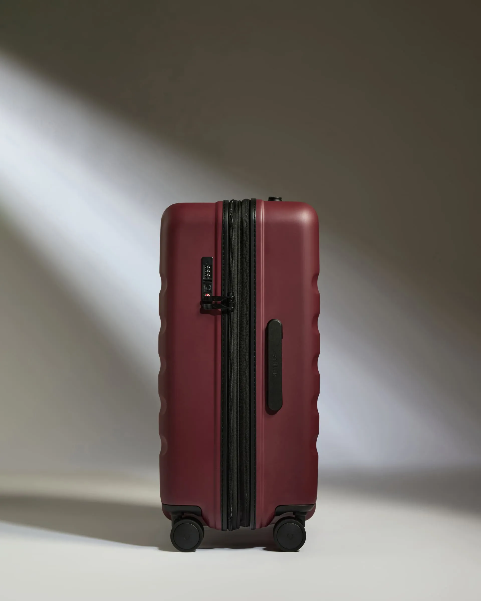 Medium Luggage in Cedar Red - Icon Stripe