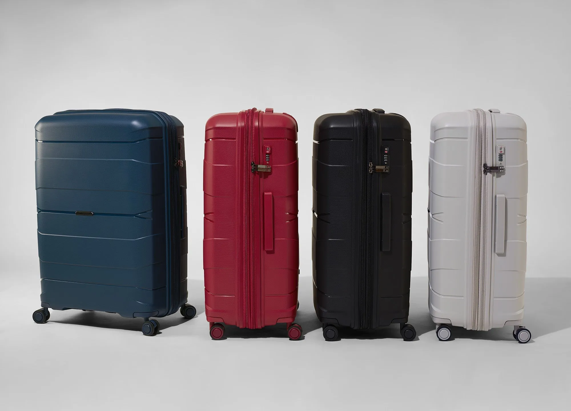 Momentous 25" Hardside Checked 8 Wheel Expandable Spinner (Tibetan Lan)